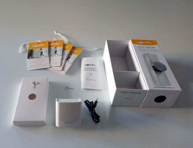 Packaging Somfy conception du Coffret Door Keeper packaging des accessoires découverte complète des produits