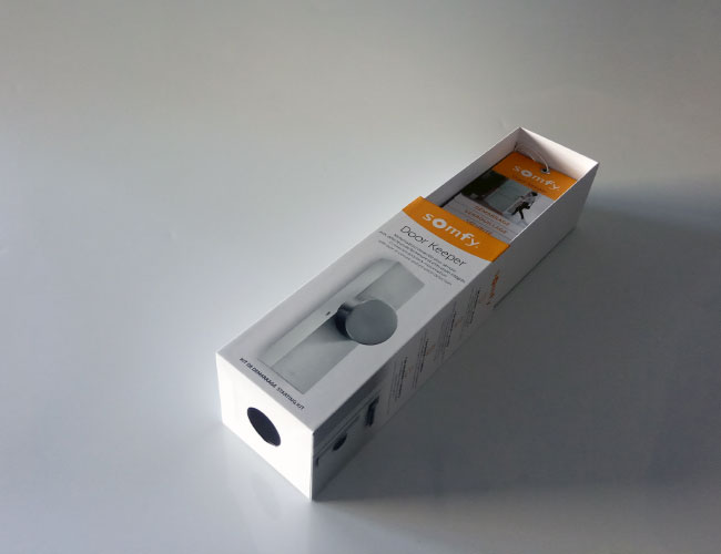 Packaging Somfy conception du Coffret Door Keeper packaging des accessoires ouvert